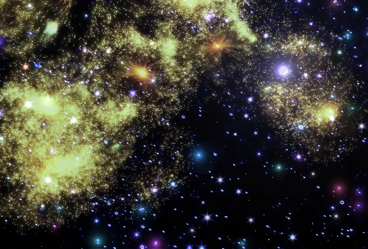 黄色く輝く銀河と星
